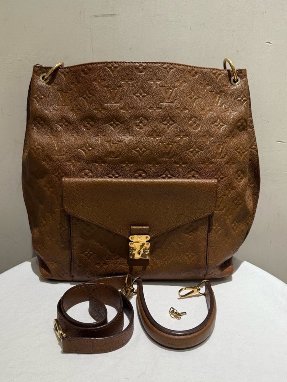 Louis Vuitton Metis Hobo Monogram Embossed Leather Tote